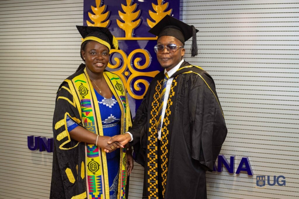 Picture of Ephraim shaking the hands of the University of Ghana's Vice-chancellor. Picture of Ephraim shaking the hands of the University of Ghana's Vice-chancellor.